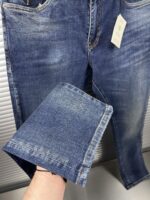 “Prada” Pocket Triangle Logo Detail Slim-Fit Denim Jeans - Image 8