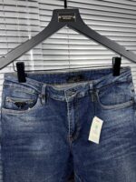 “Prada” Pocket Triangle Logo Detail Slim-Fit Denim Jeans - Image 4