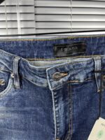 “Prada” Pocket Triangle Logo Detail Slim-Fit Denim Jeans - Image 6