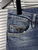 “Prada” Pocket Triangle Logo Detail Slim-Fit Denim Jeans - Image 5