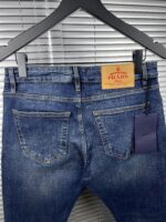 “Prada” Pocket Triangle Logo Detail Slim-Fit Denim Jeans - Image 7