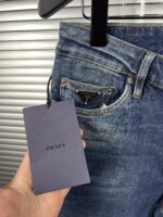 “Prada” Pocket Triangle Logo Detail Slim-Fit Denim Jeans - Image 9